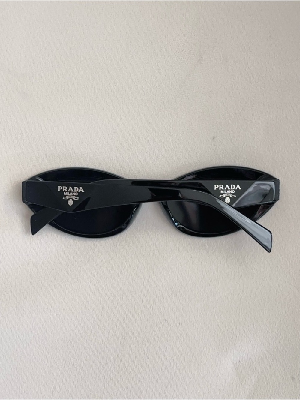 Prada Black Oval Logo Sunglasses
